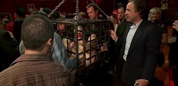 Blindfolded slaves bound in metal box